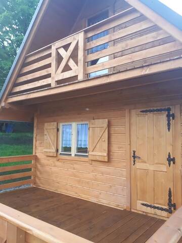 Фото номера Шале с двумя спальнями Дома для отпуска Domek Pod Dębem г. Ryczów 18