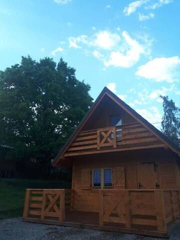 Фото номера Шале с двумя спальнями Дома для отпуска Domek Pod Dębem г. Ryczów 31