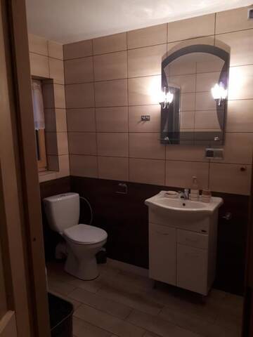 Фото номера Шале с двумя спальнями Дома для отпуска Domek Pod Dębem г. Ryczów 37